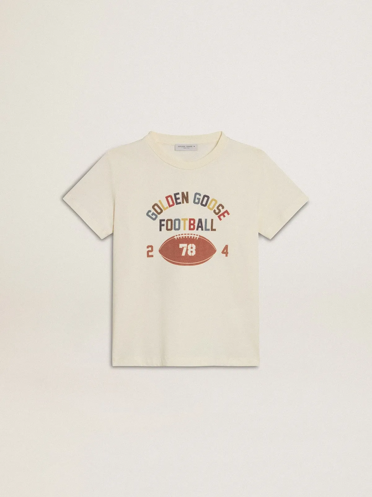 Camiseta de niño color blanco envejecido con mensaje multicolor