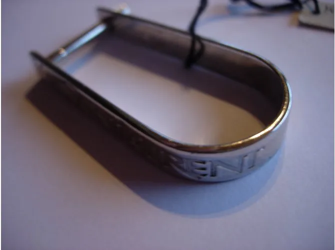 Llavero Yves Saint Laurent en plata de ley. 925 