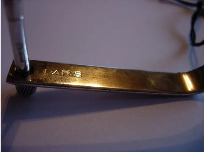 Llavero Yves Saint Laurent en plata de ley. 925 