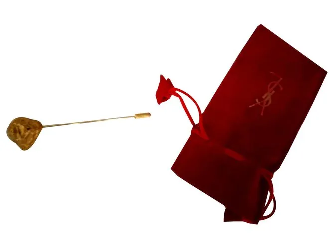 Yves Saint Laurent Alfileres y broches Dorado 