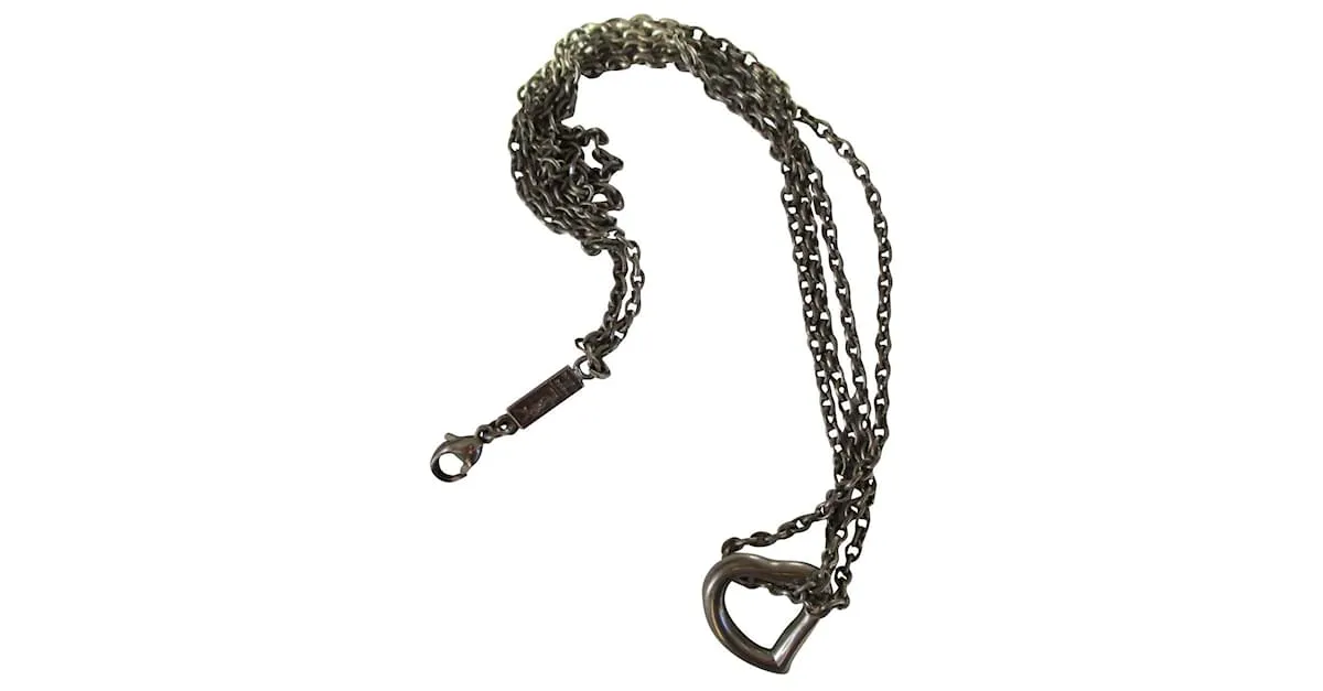 Yves Saint Laurent amor corazon. Plata 