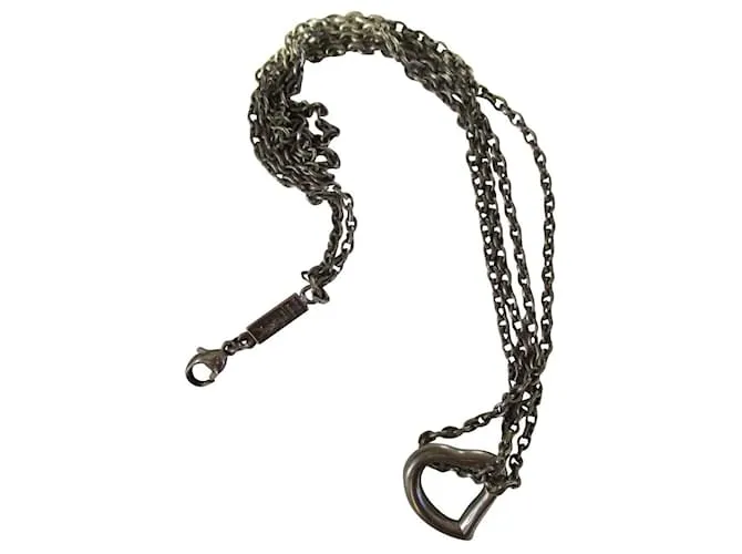 Yves Saint Laurent amor corazon. Plata 