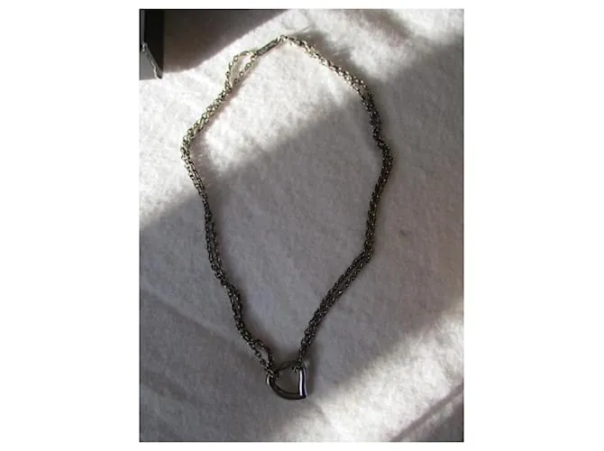 Yves Saint Laurent amor corazon. Plata 