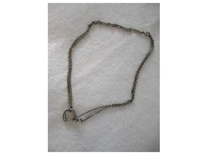 Yves Saint Laurent amor corazon. Plata 