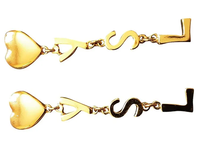 YVES SAINT LAURENT.  Clips de logotipo de letras. Gold hardware 