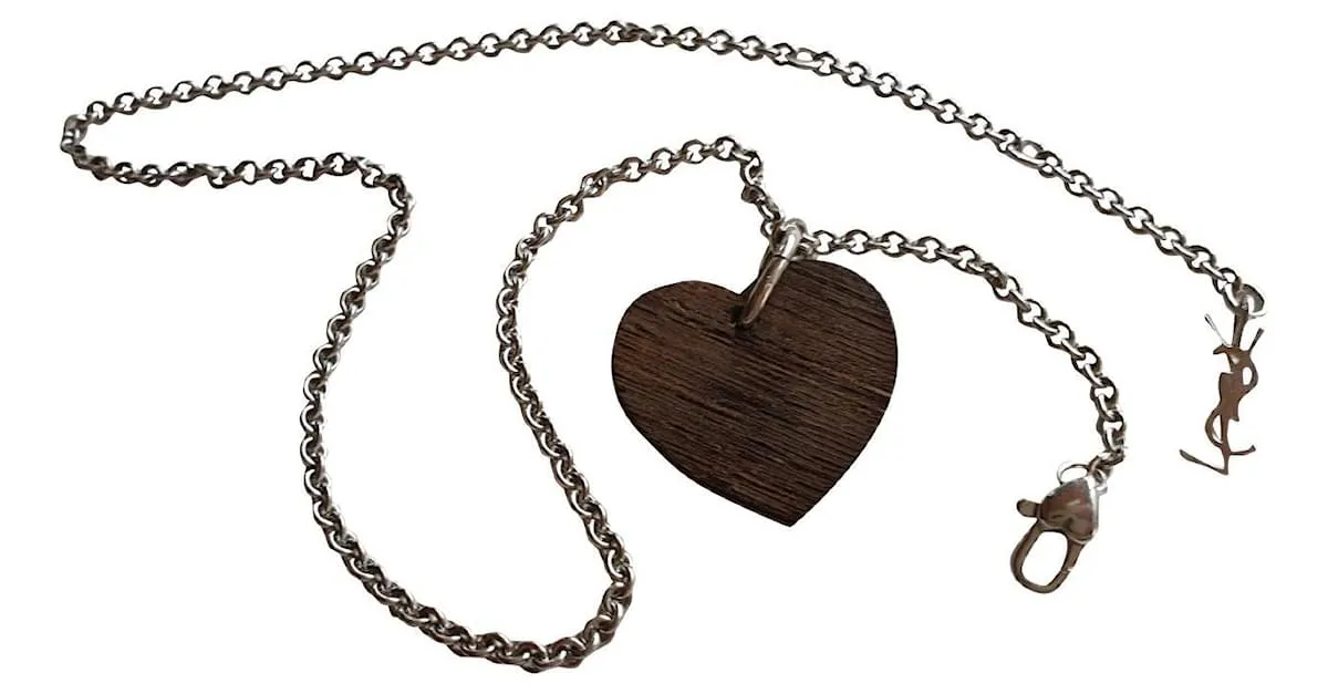 Yves Saint Laurent Colgante corazón en madera y plata 925 Castaño 