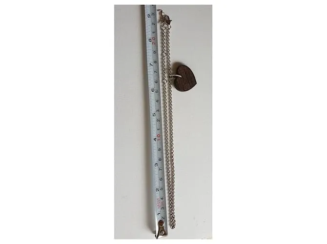 Yves Saint Laurent Colgante corazón en madera y plata 925 Castaño 