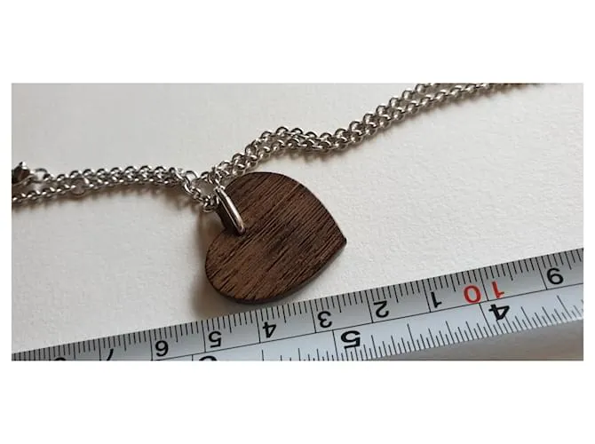 Yves Saint Laurent Colgante corazón en madera y plata 925 Castaño 